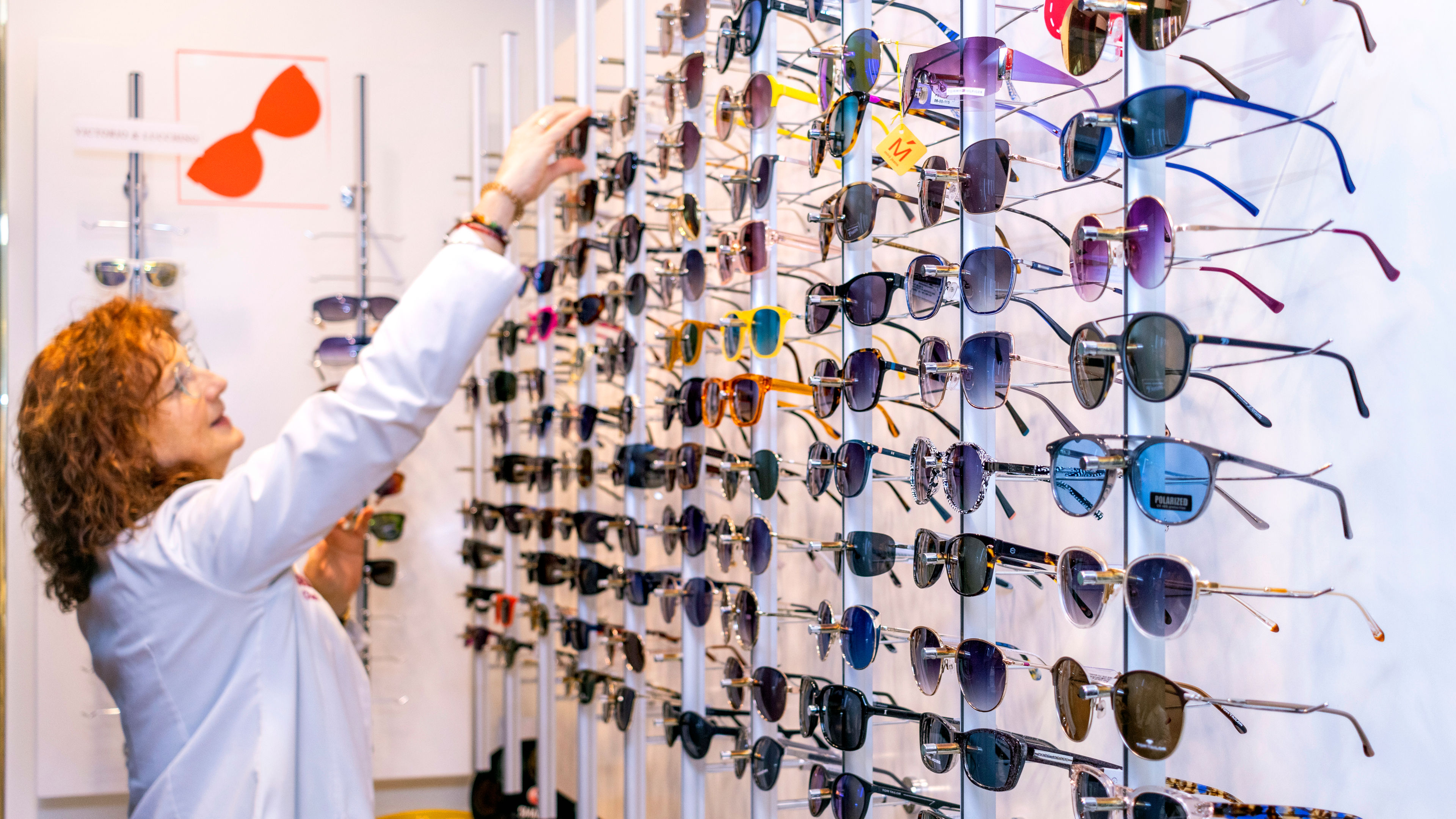 A couple trying sunglasses