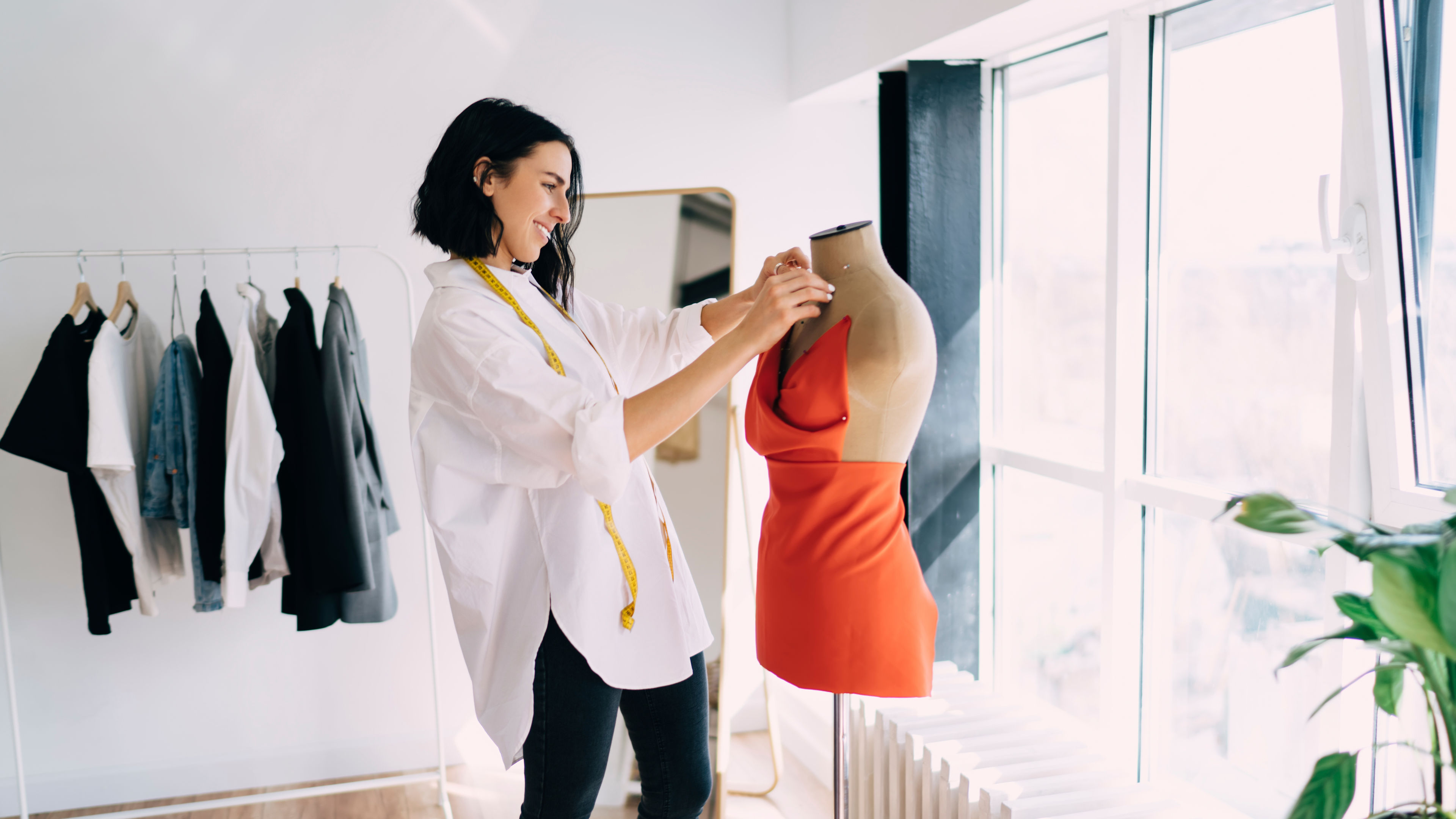 A fashion designer looking at her new creativity
