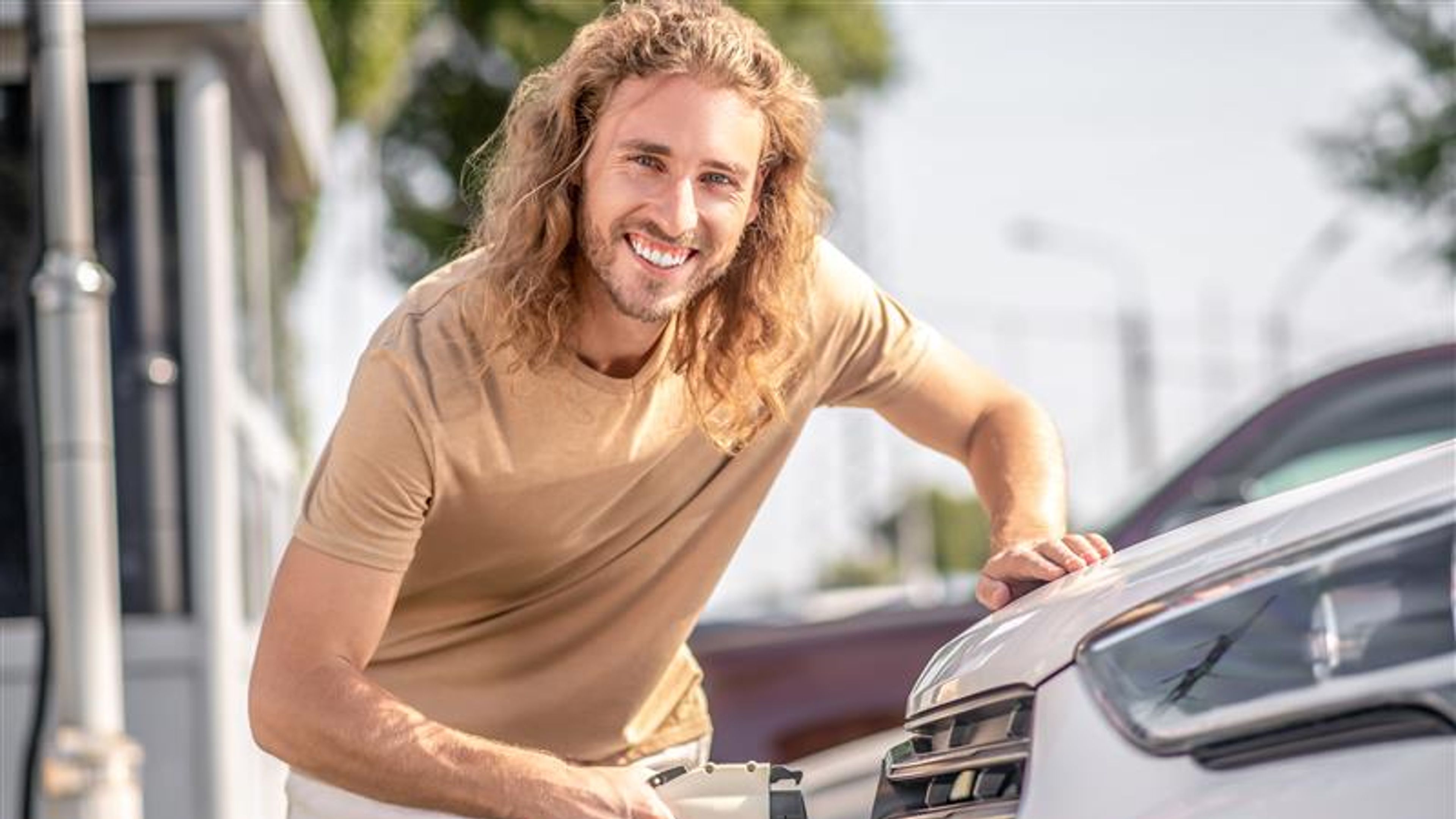 A man cleaning his car