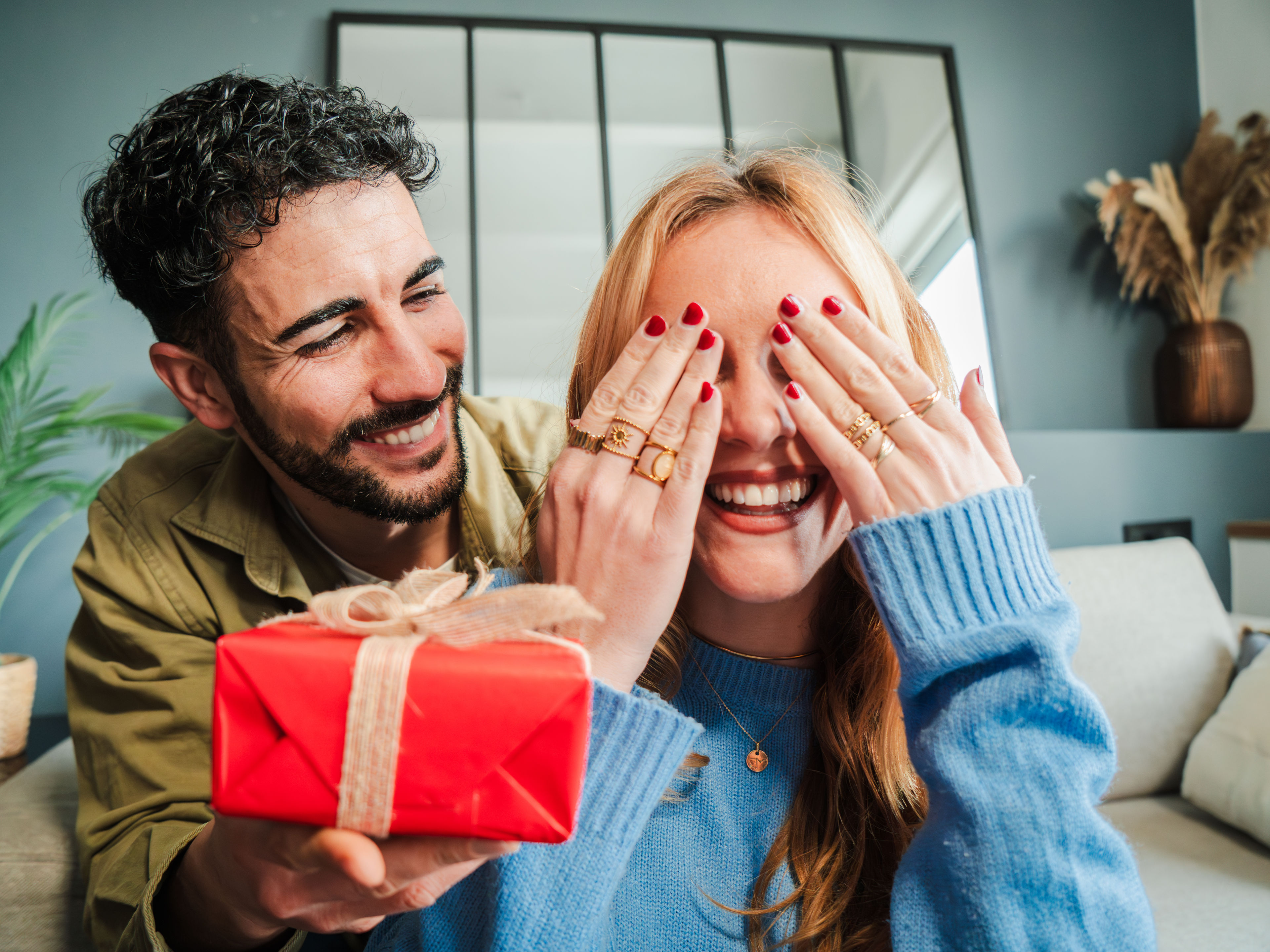 A man surprising wife with a hamper