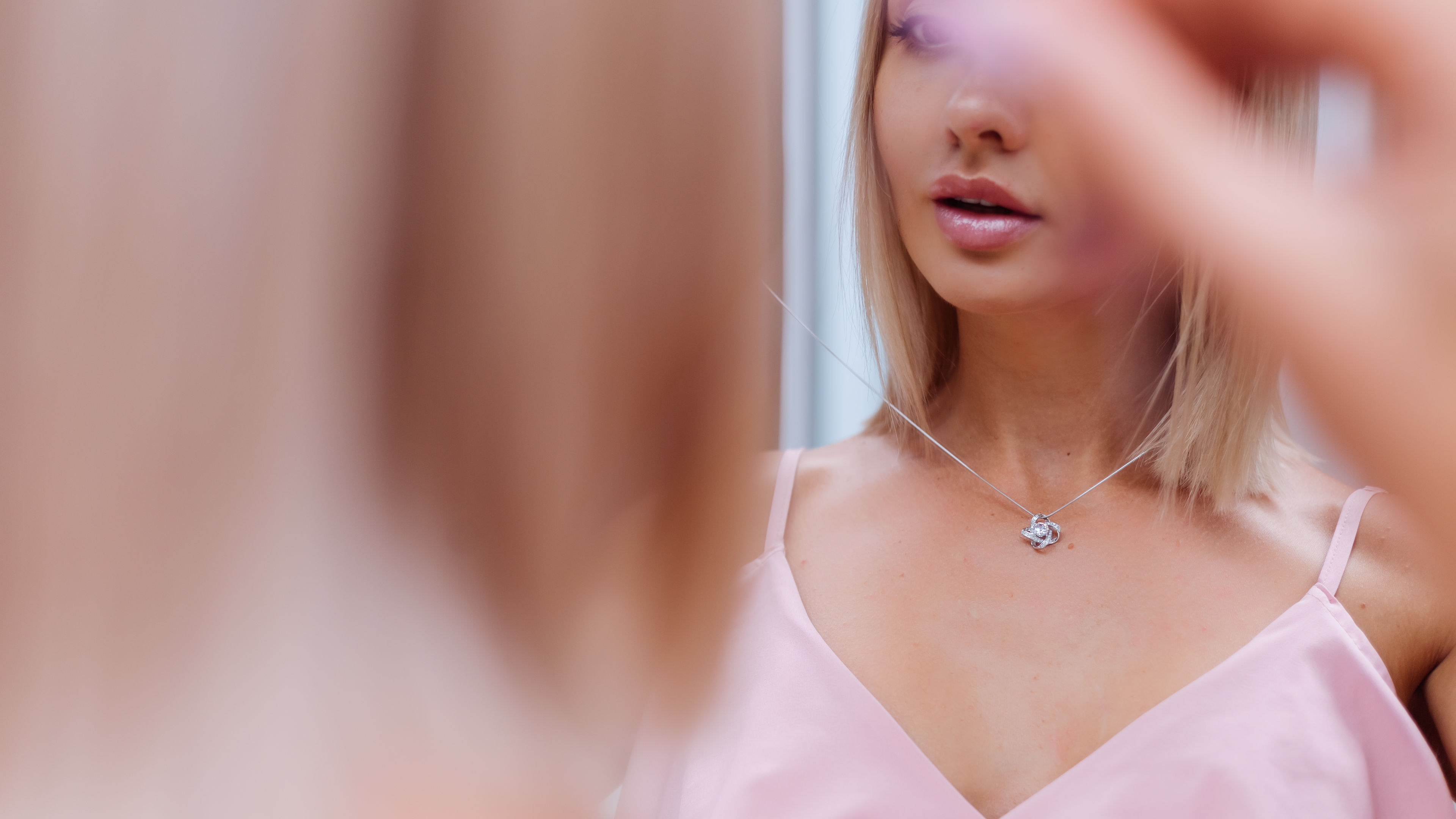 A woman trying necklace