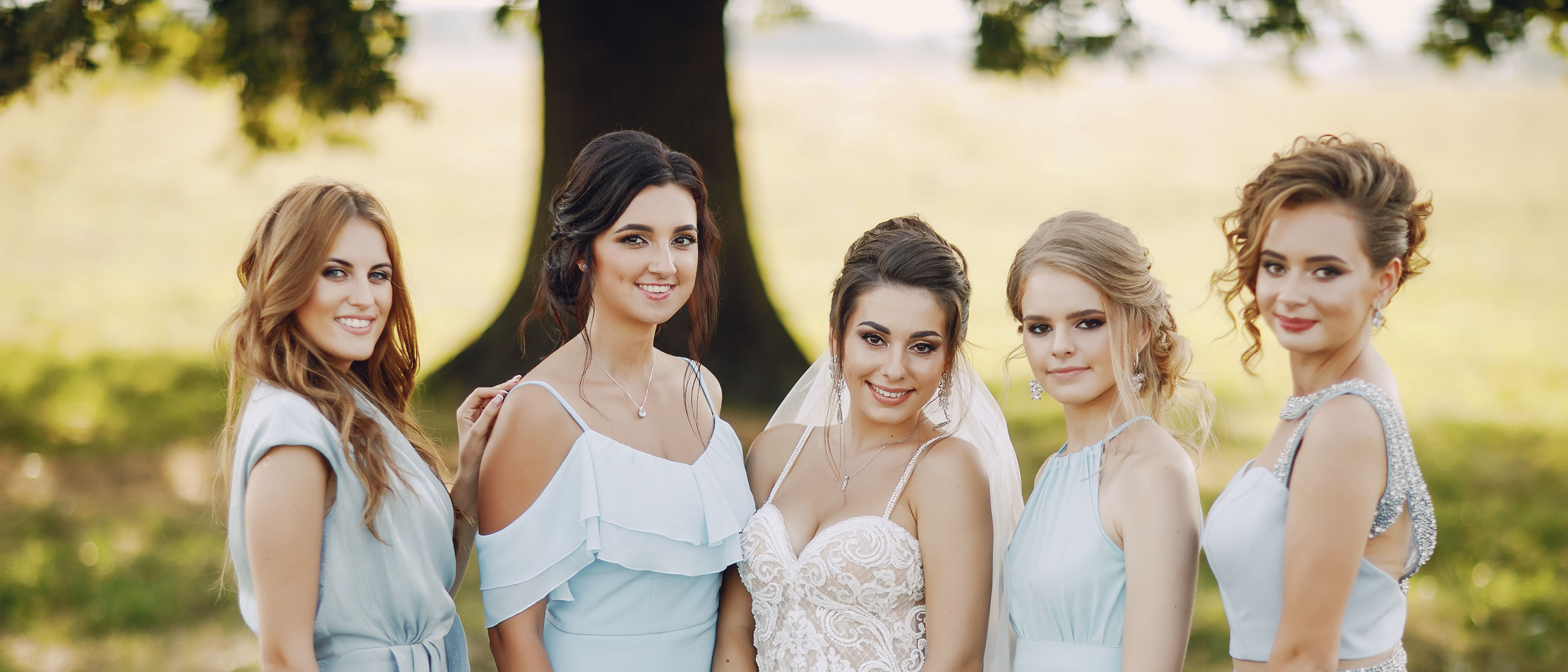 Bride and Bridesmaids Pose 