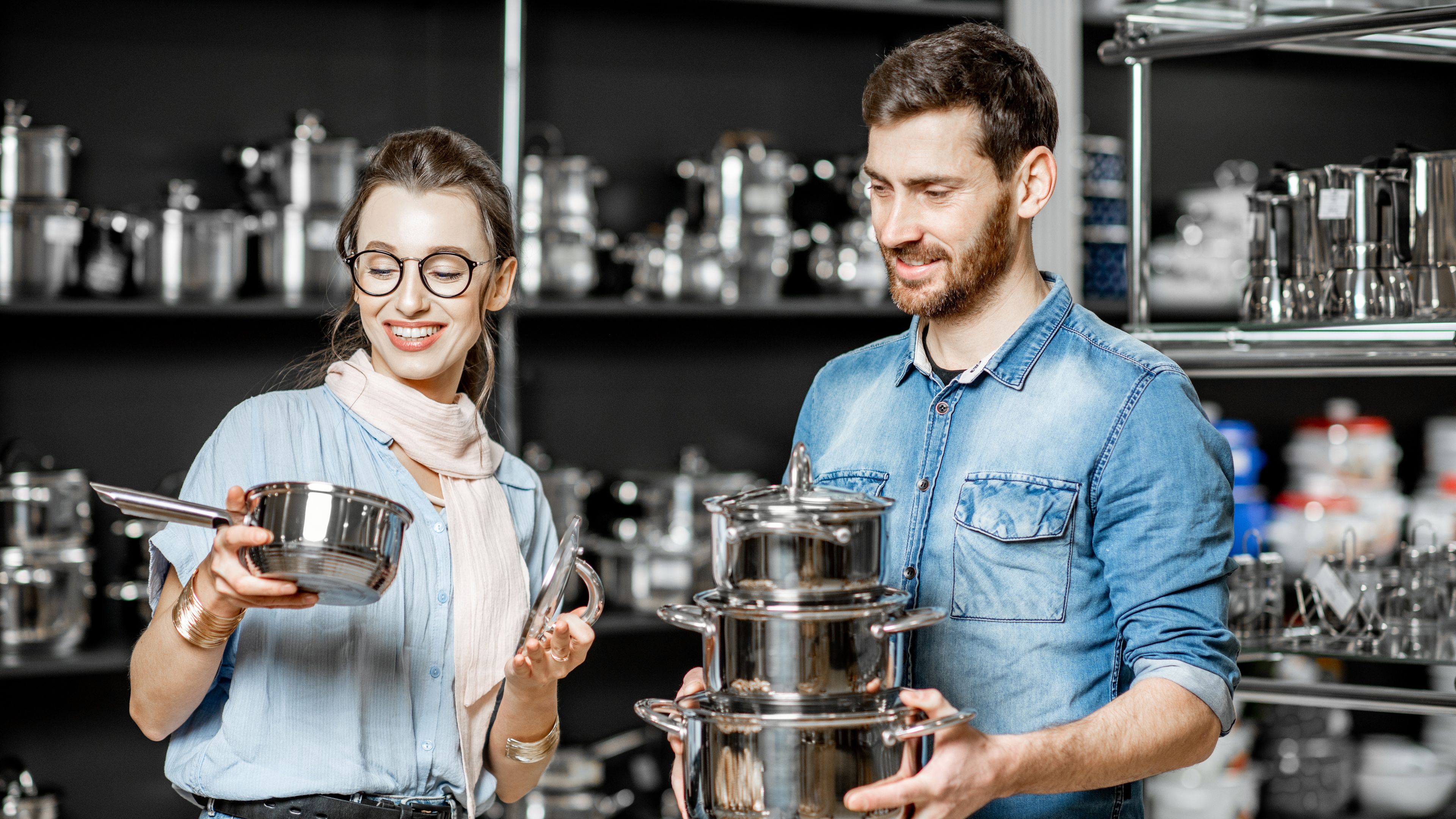 Couple choosing cookware