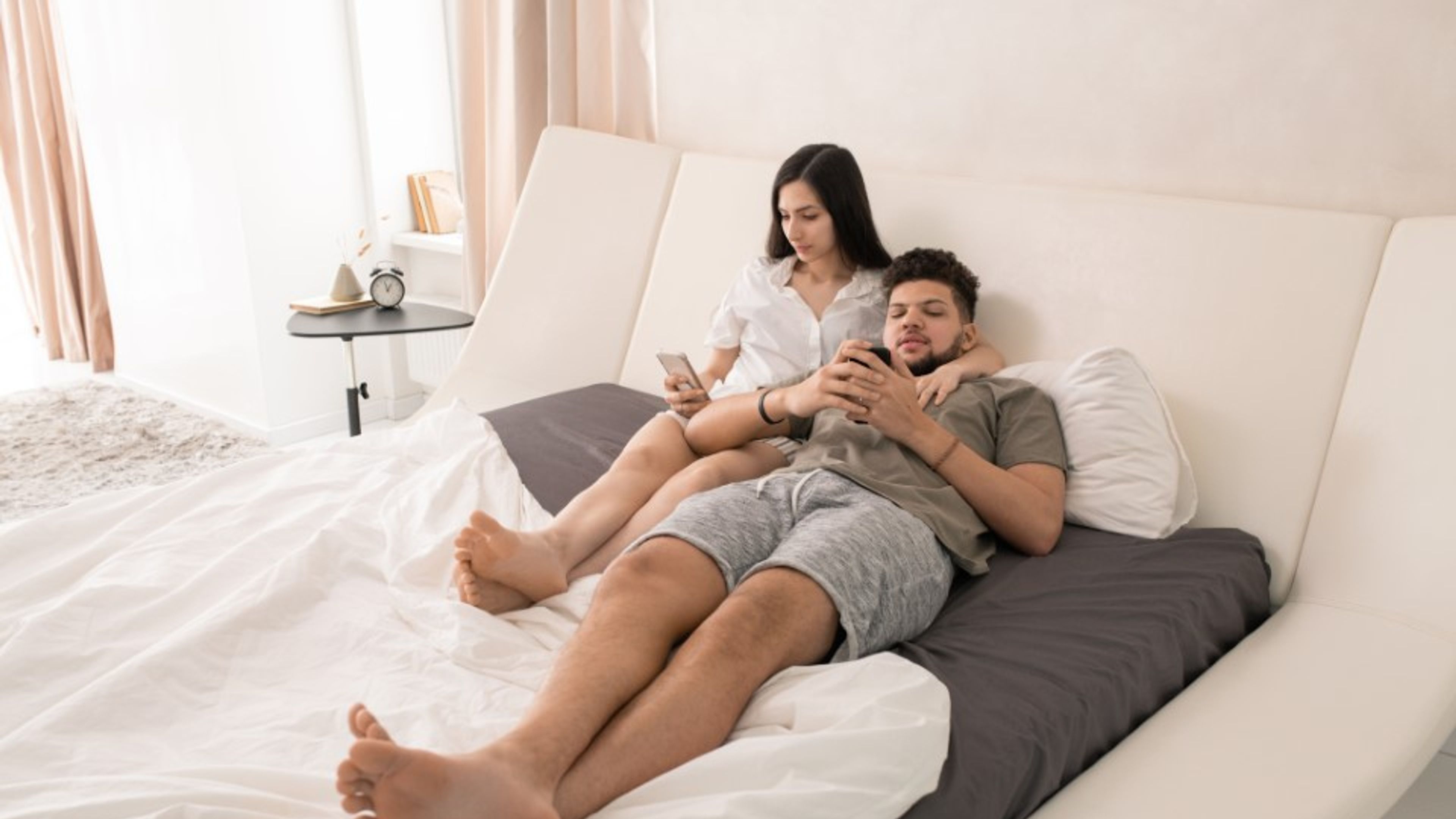 Couple on adjustable bed