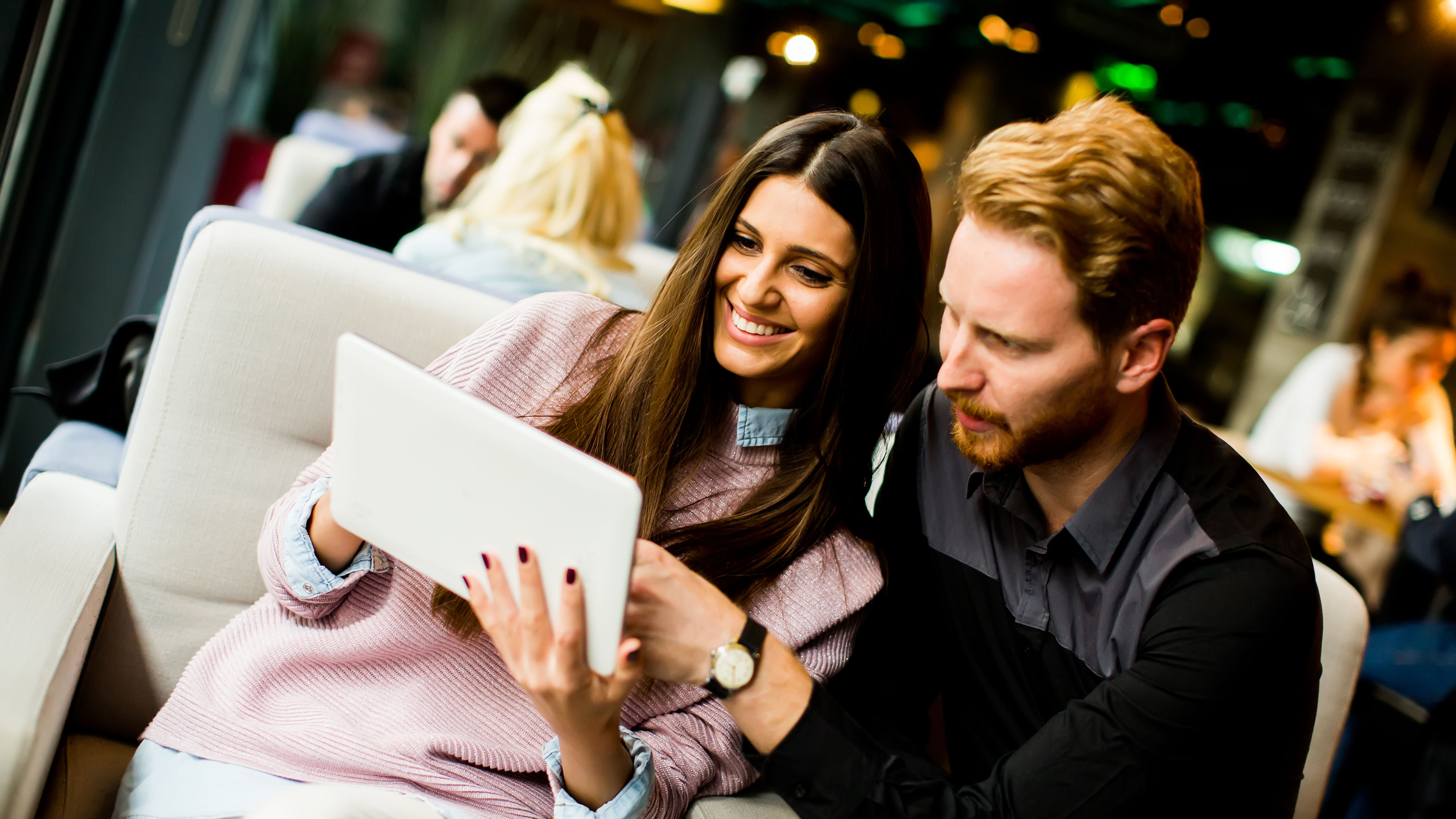 Couple using an iPad