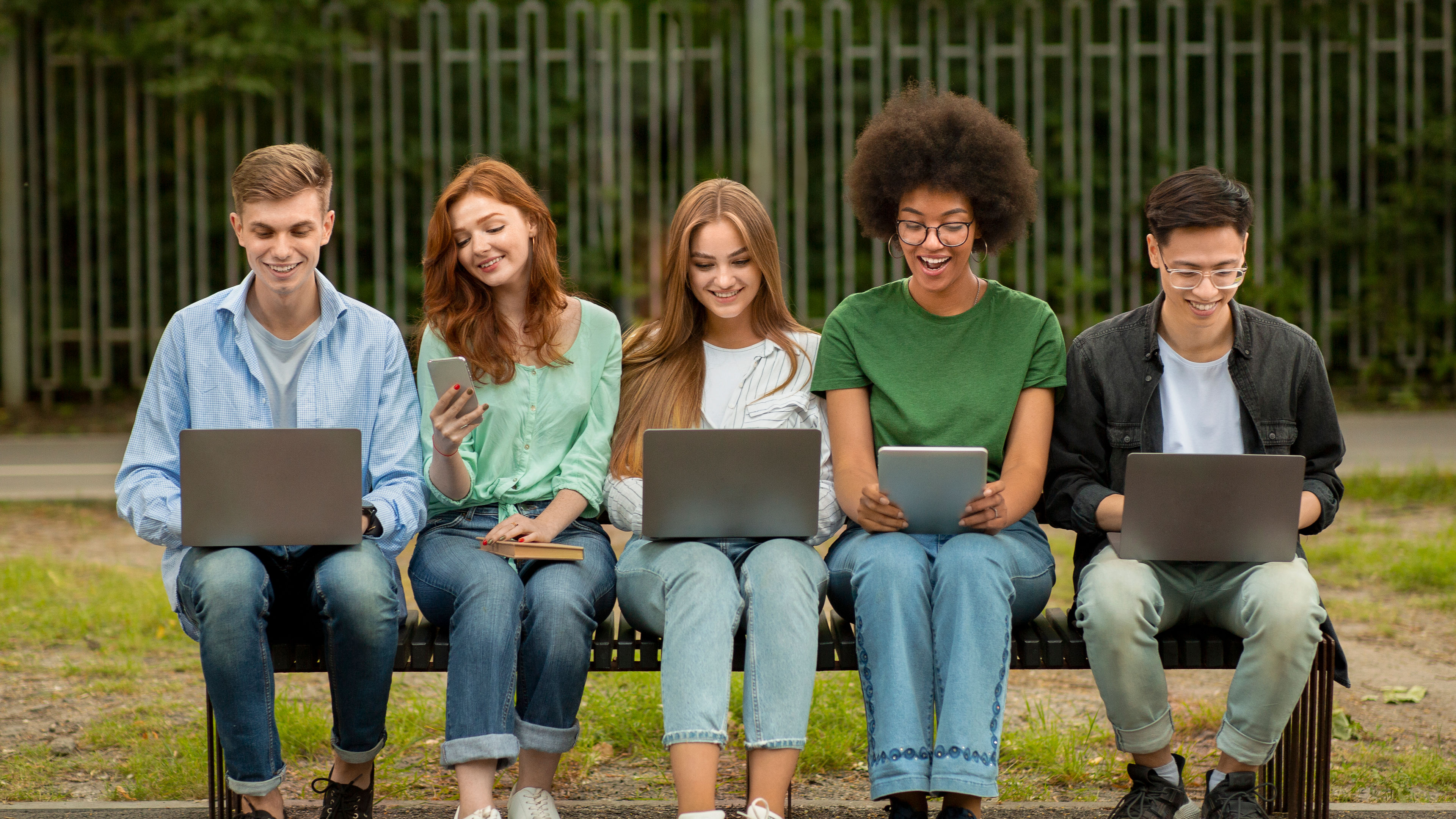 Diverse Teenage Students with gadgets