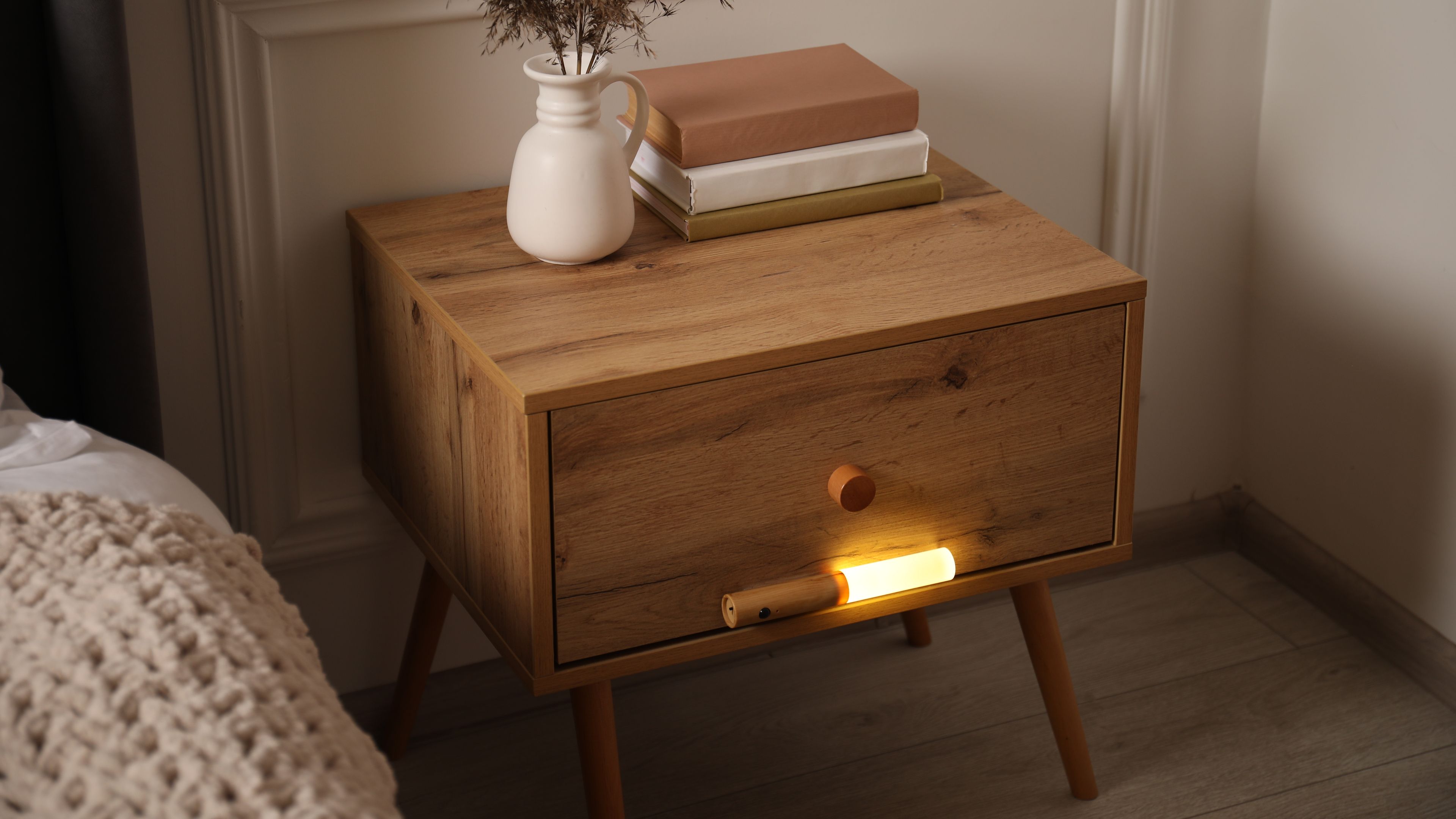 Elegant bedside table with wooden finish 