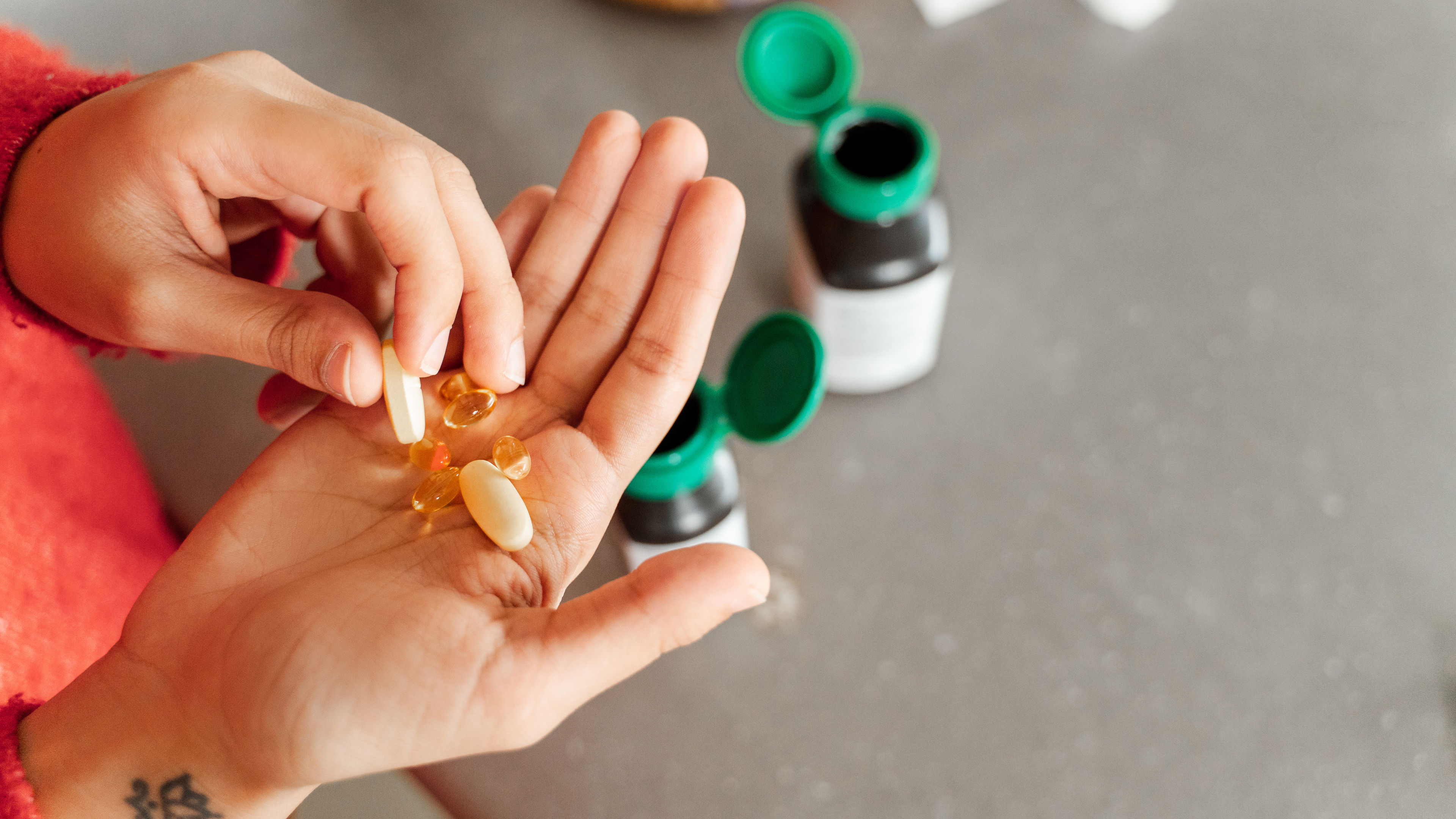 Hand full of vitamin supplement 