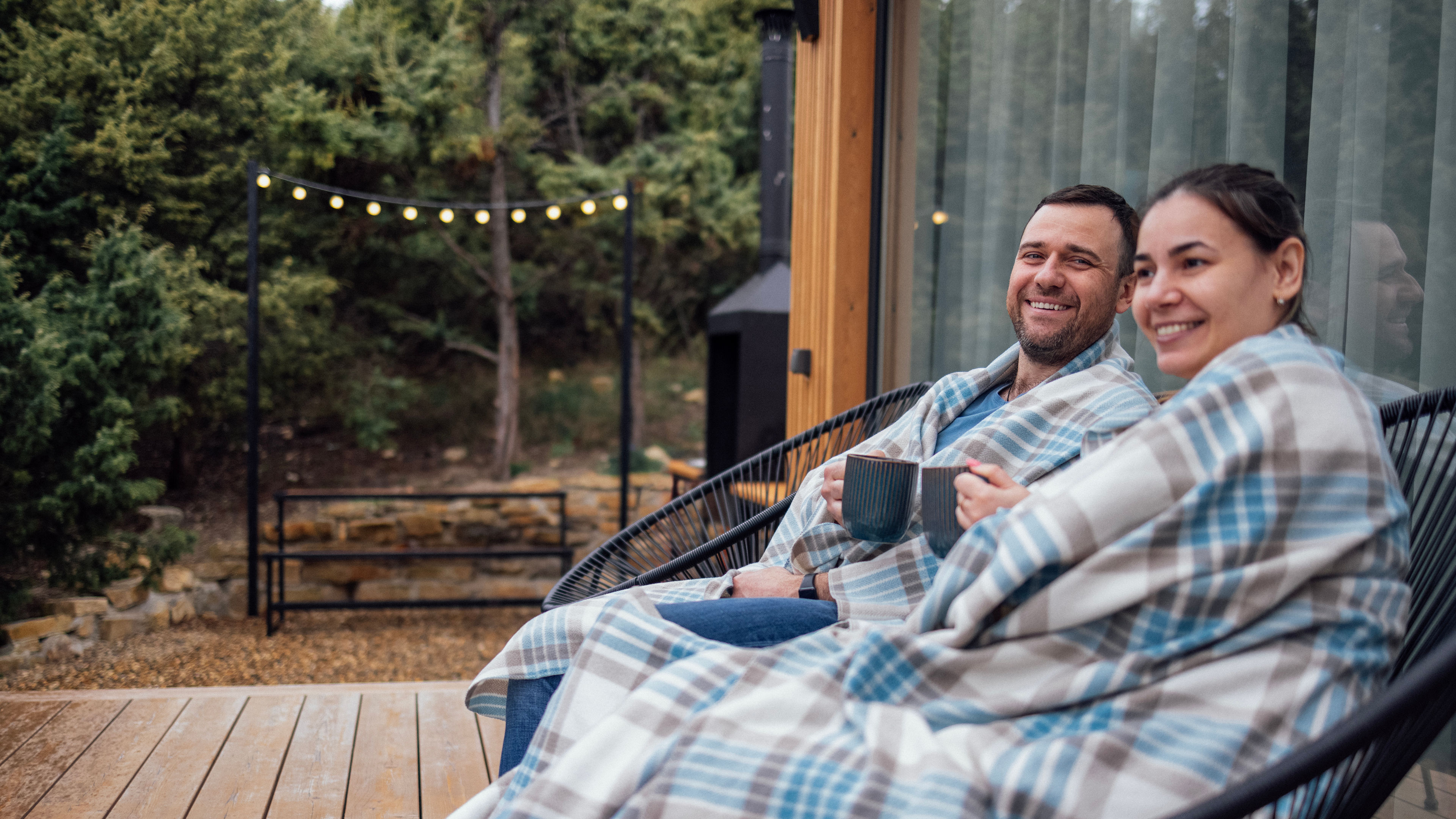 Man and woman are sitting and drinking tea 