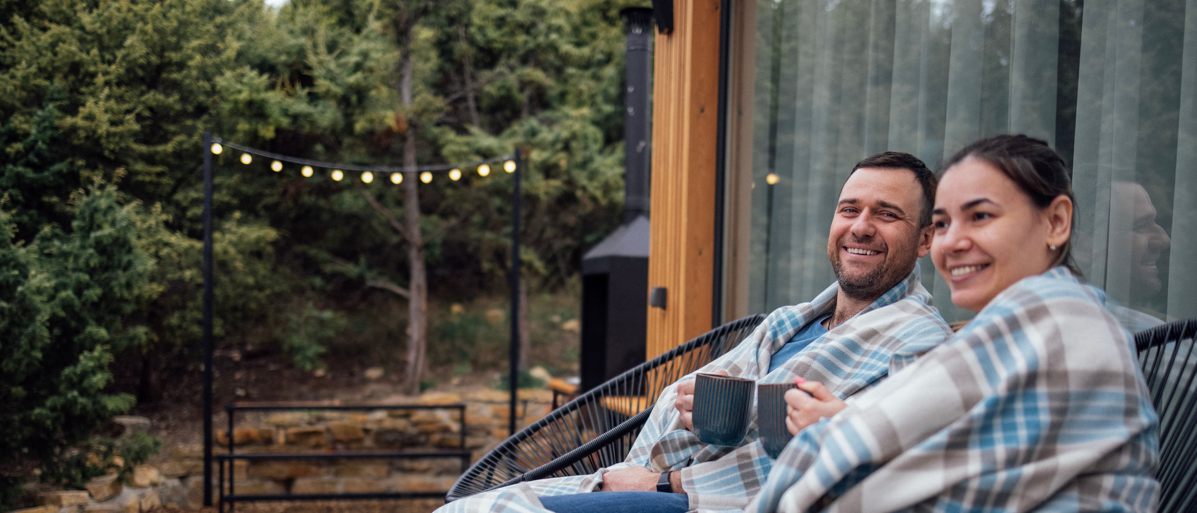 Man and woman are sitting and drinking tea 
