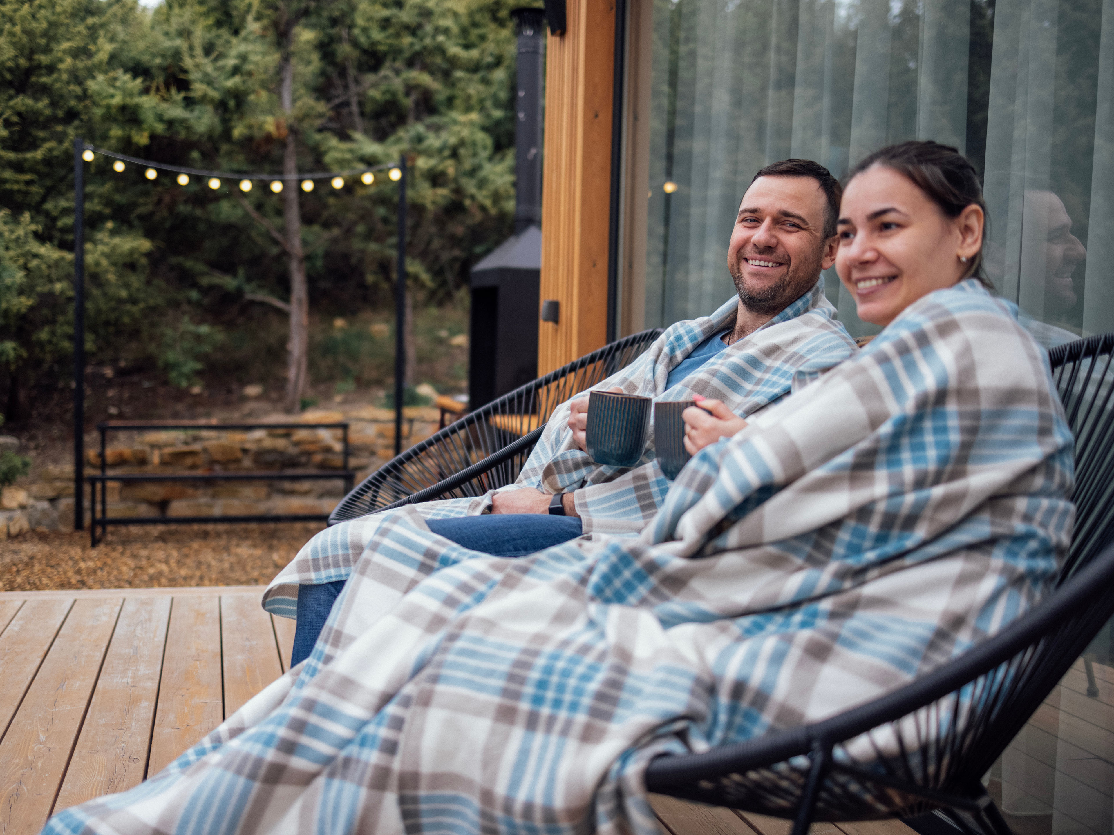 Man and woman are sitting and drinking tea 