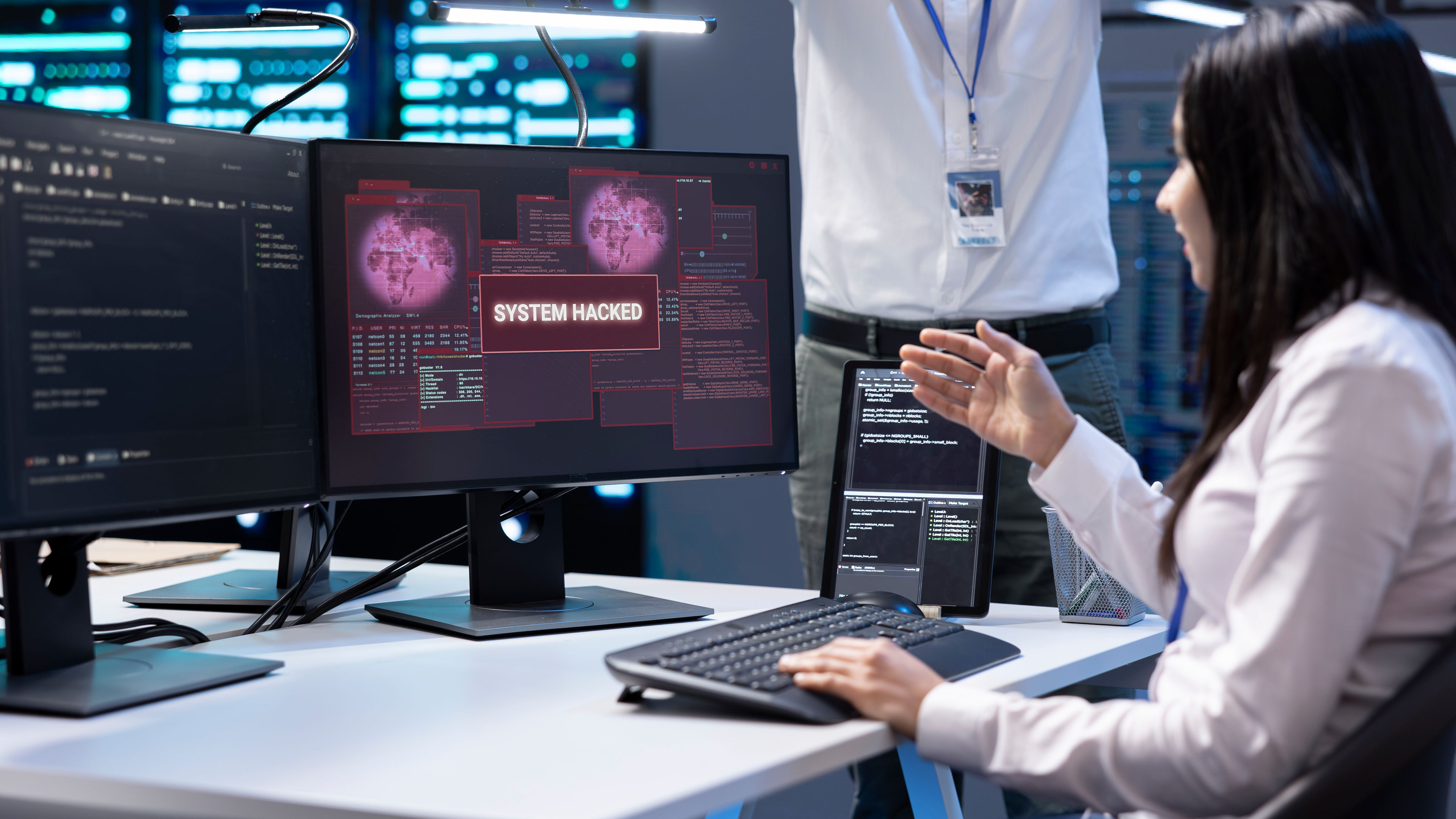 People looking at screen in a lab.