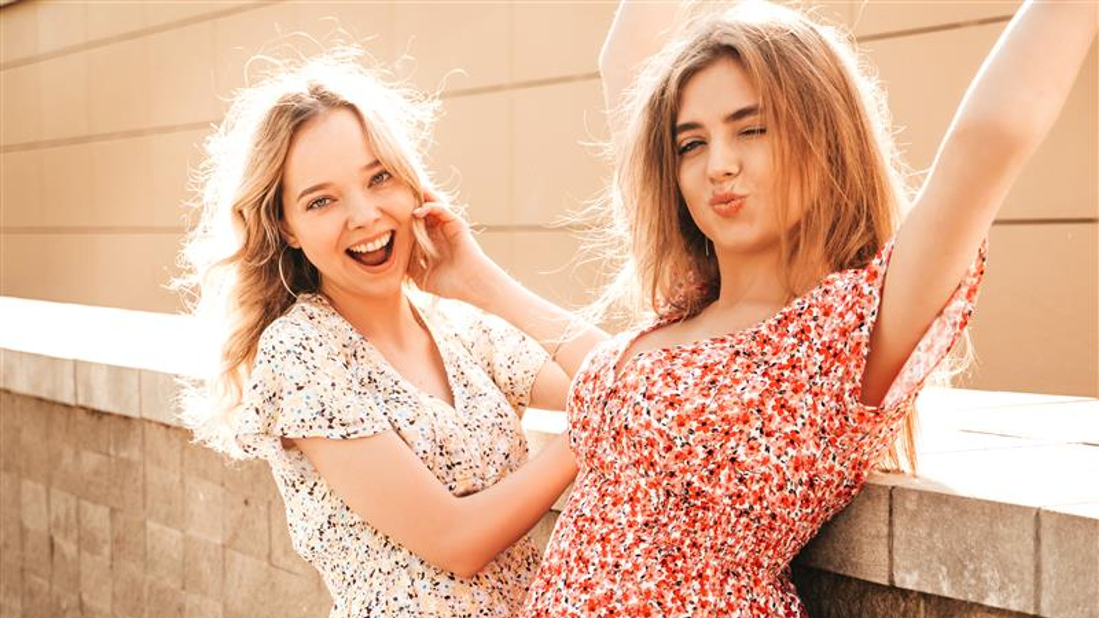 Two women in a floral dress