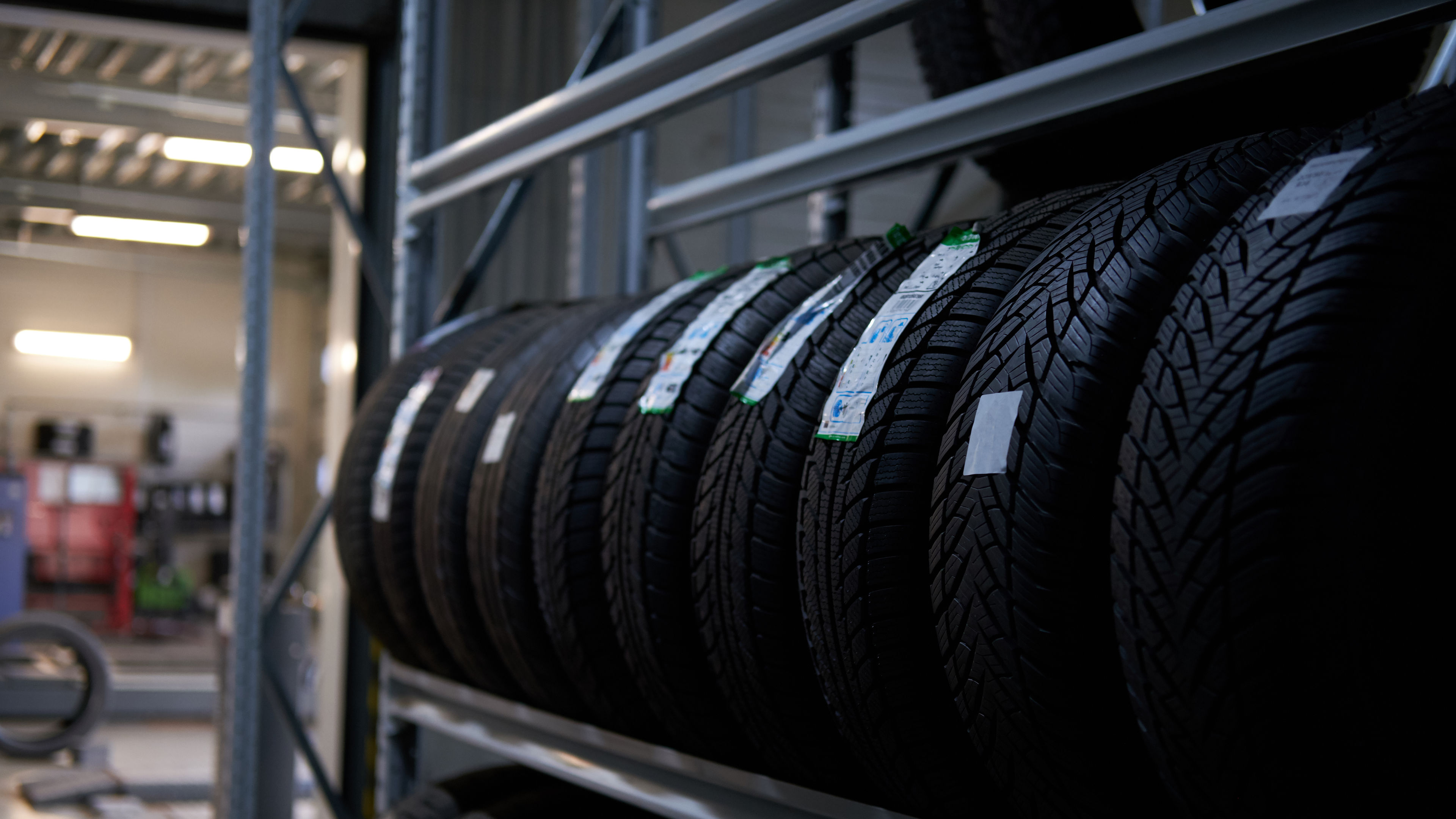 Variety of tyres at busy warehouse