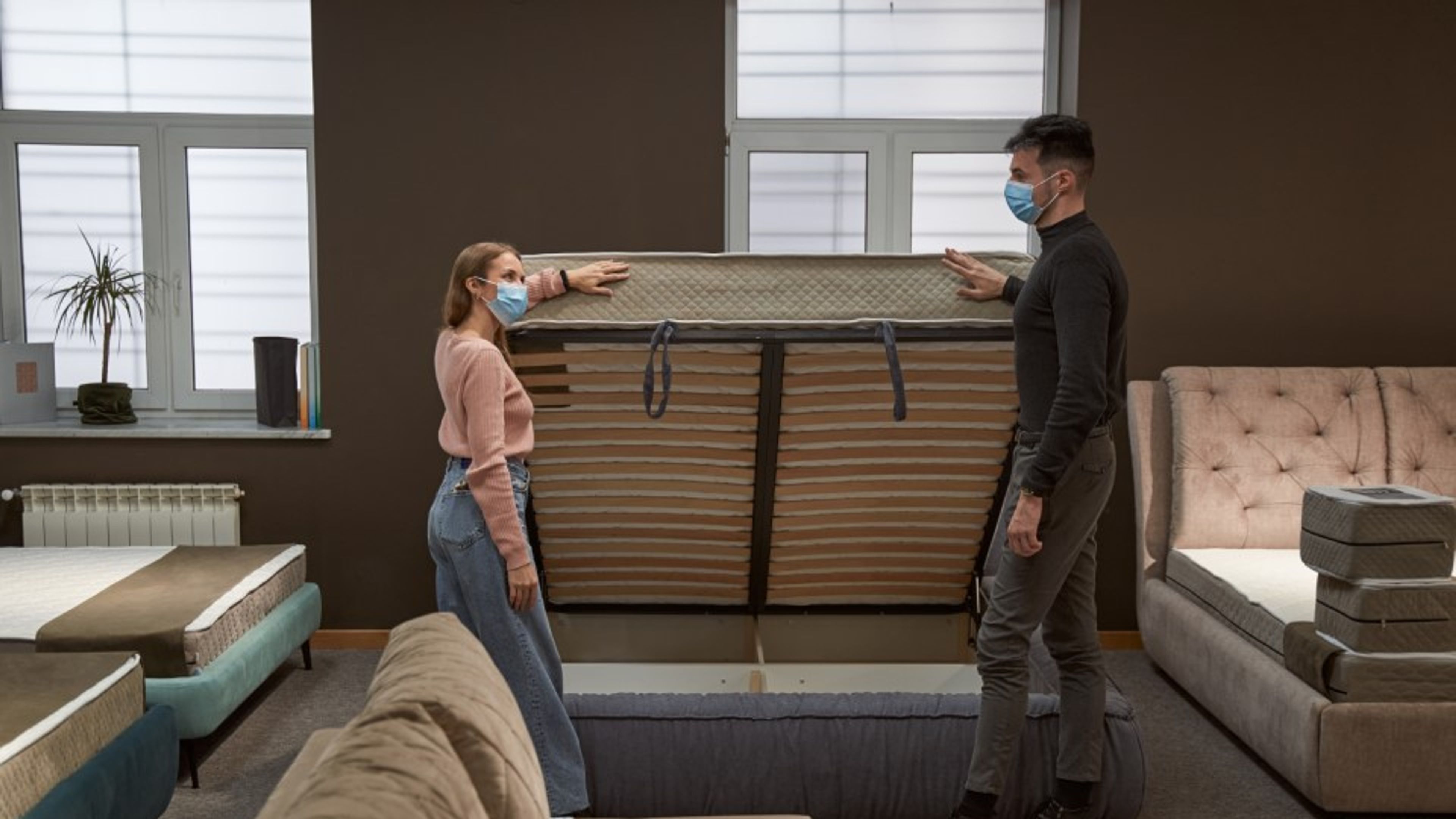 woman customer asking about bed