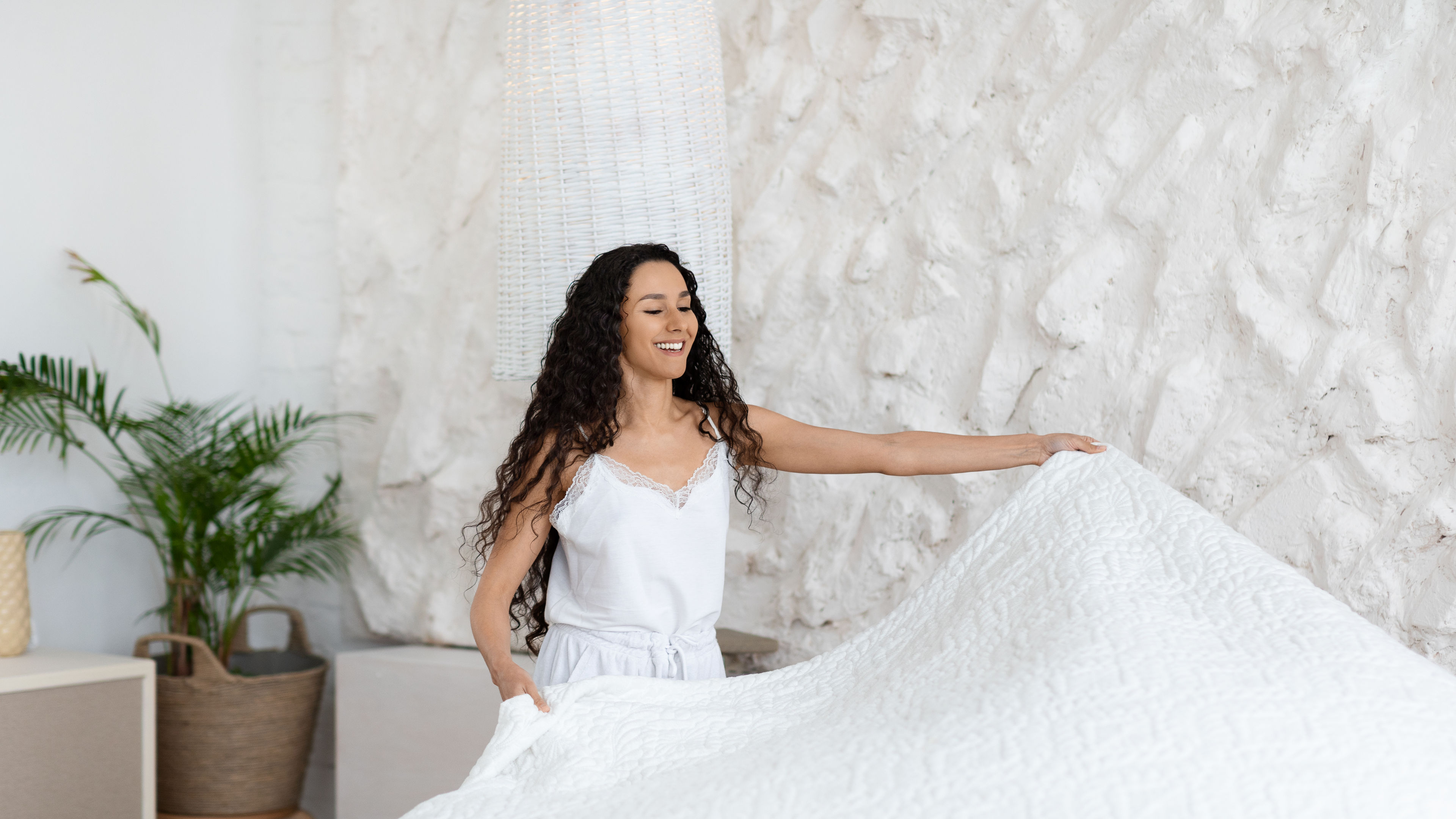 Woman Making Bed 

 