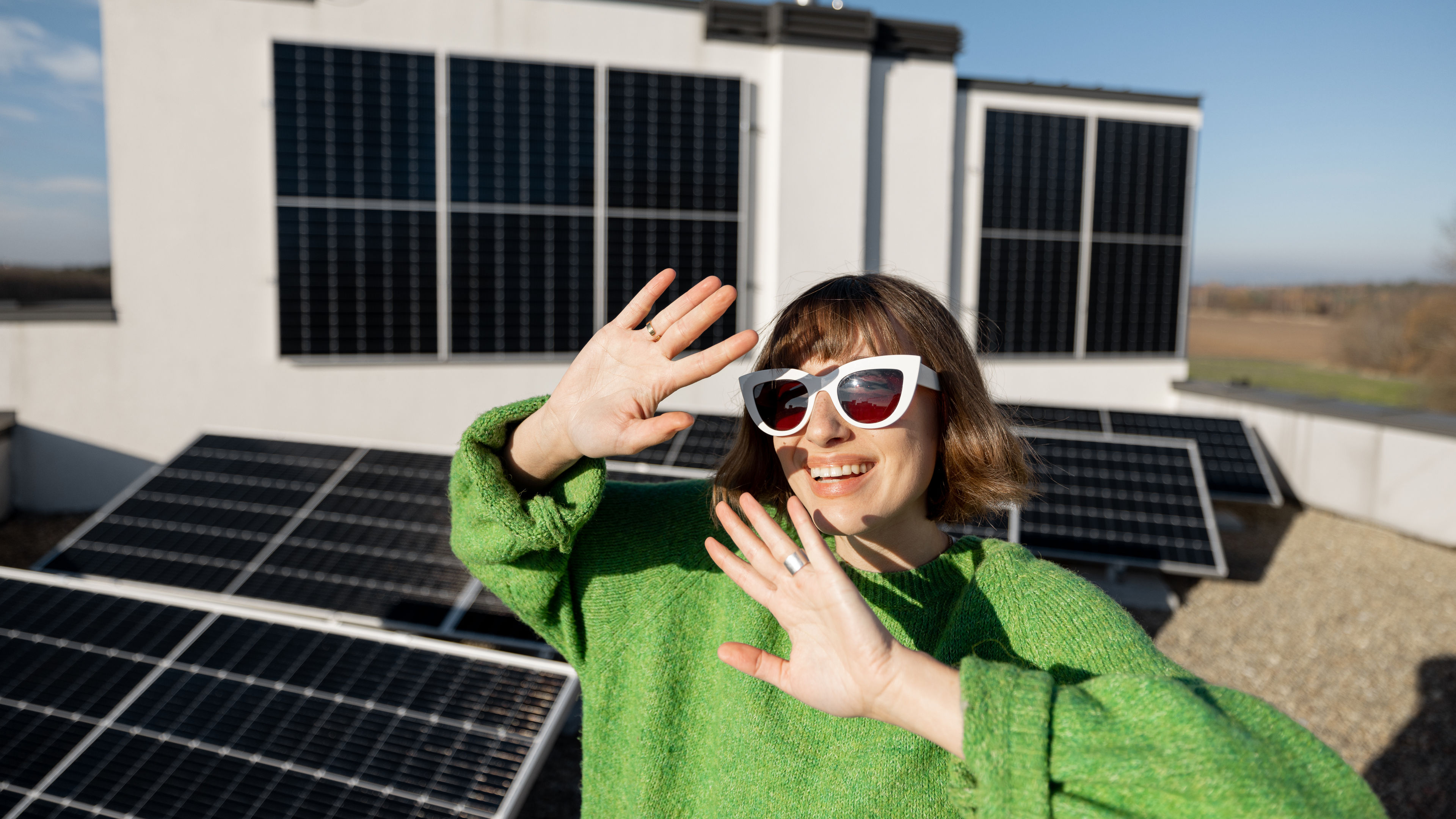 Woman near solar panel