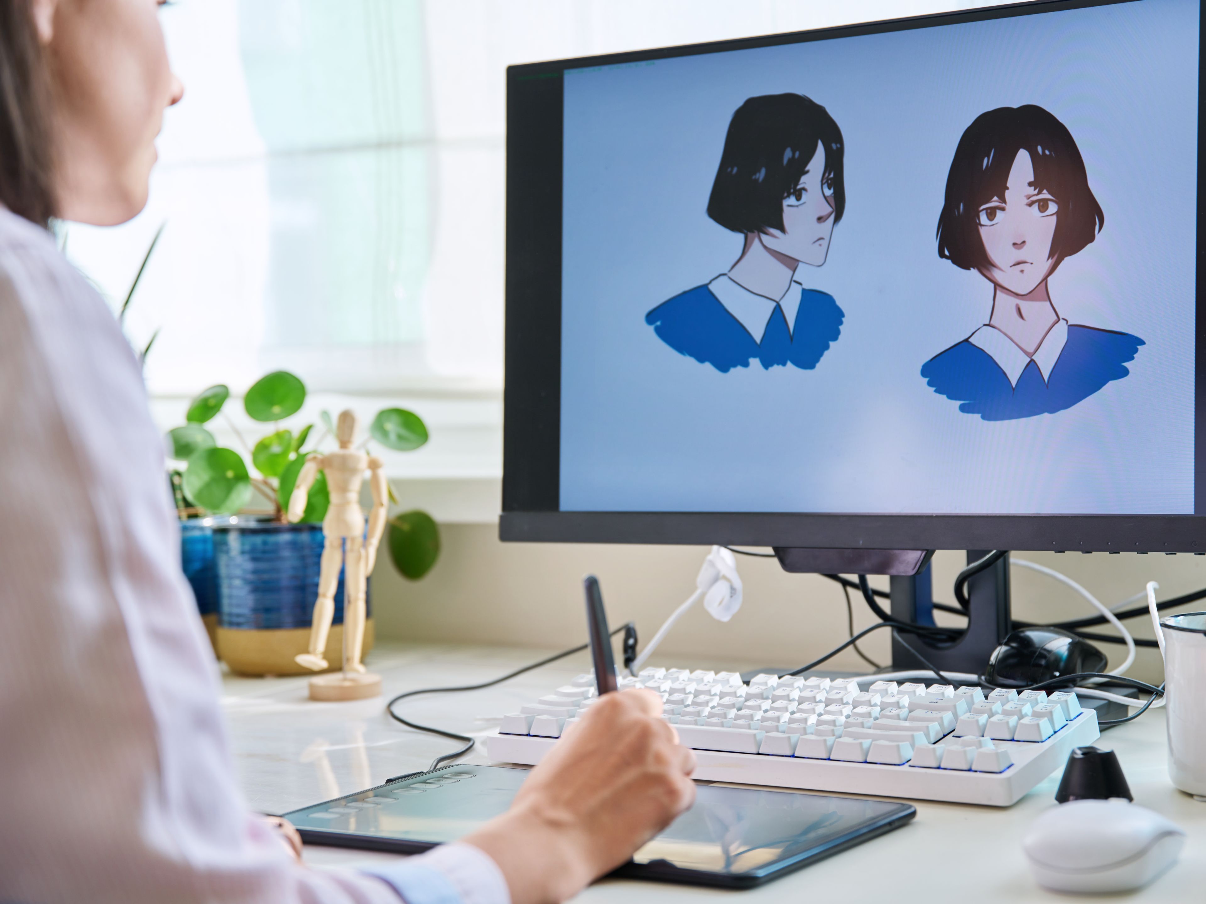 Woman Using Graphics Tablet 